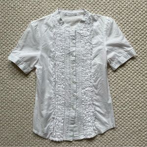 White short sleeved blouse with frilly front